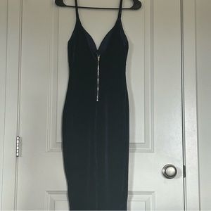 Very dark navy blue size medium.